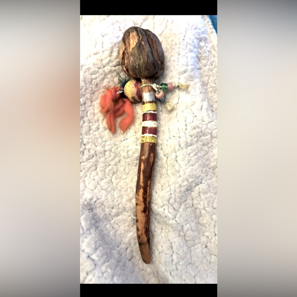 Handcrafted Native American rattle, from rawhide,wood,& adorned with beads